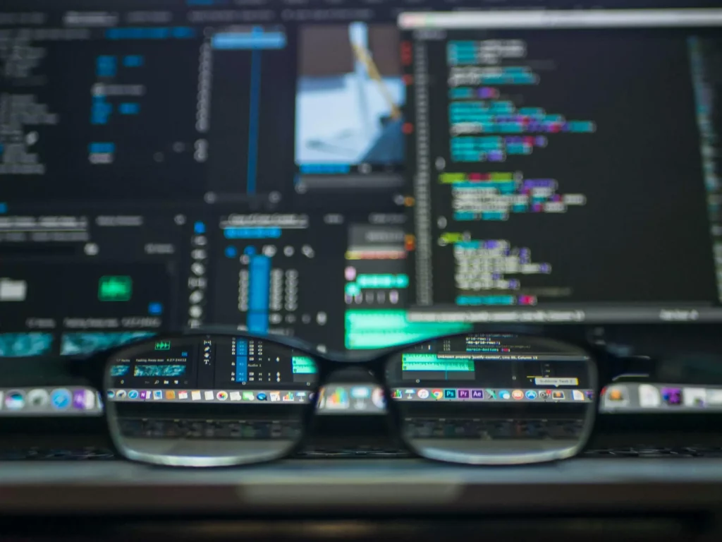 Glasses at first with desktop screen on the back, representing Mellone's custom Automated Testing Tools